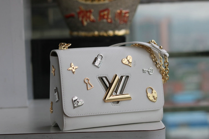 Wholesale Cheap AAA Louis Vuitton Love Lock Charm Twist Bag for sale