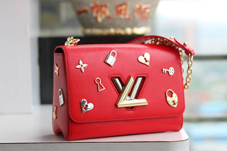 Wholesale Cheap AAA Louis Vuitton Love Lock Charm Twist Bag for sale