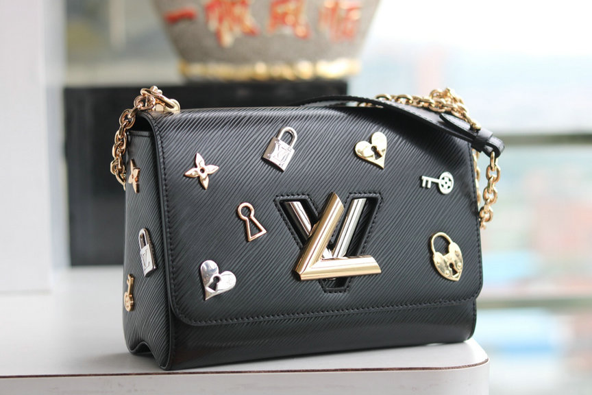 Wholesale Cheap AAA Louis Vuitton Love Lock Charm Twist Bag for sale